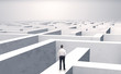 © ra2 studio - Small businessman in a middle of a huge maze