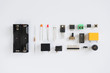 Top view of electronics component such as resistor, ICs, capacitor, switch, LED, battery case, relay and connector.