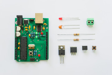 Top view of electronics component such as PCB board, resistor, ICs, capacitor, switch, and connector.