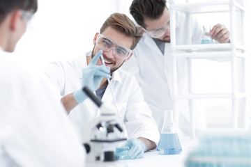 Wall Mural - background image science team in the lab