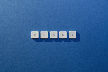 description of the word Peace with the letters of an old keybord