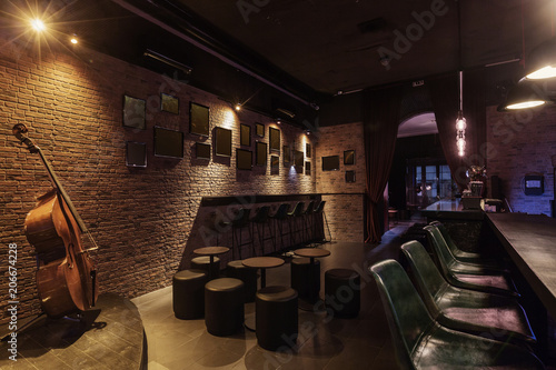 Modern Jazz Bar Interior Design Stage With Cello Lamps