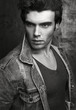 © Bakulov - Closeup monochrome fashion portrait of a beautiful young man.