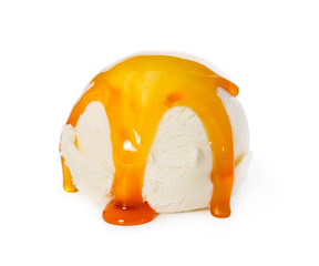 vanilla ice cream ball with caramel syrup isolated on white