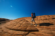 © Maygutyak - Hiker on a trail in volcanic Snow canyon State Park in Utah, USA