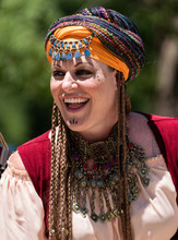 Happy Smiling Belly Dancer At Pirate Festival With Turban