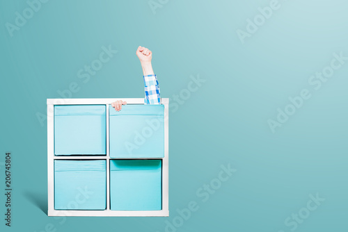 Fist Pulled Out Of The Drawer Victory Gesture White Dresser With