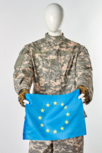 Mannequin Soldier Holding European Flag. White Isolated Background.