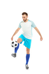 Wall Mural - Young man playing football on white background