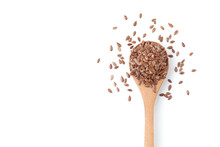 Flax Seeds In A Wooden Spoon On White Background