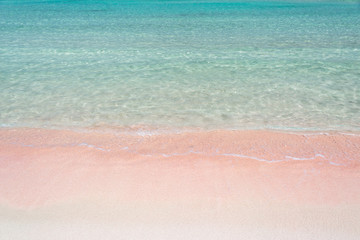 Pink sand and turquoise pristine water on Balos beach in Crete, Greece, summer travel and beach vacations background