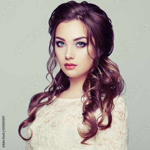 Brunette Woman With Long And Shiny Curly Hair Beautiful