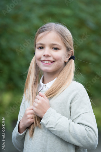 Hairstyle And Hair Care Concept Girl On Smiling Face Posing