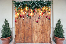 Rustic Wedding Photo Zone. Hand Made Wedding Decorations Includes Photo Booth  Red Flowers. Garlands And Light Bulbs

