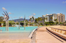 View Of Public Pool And Coastal Buildings In Cairns, Australia.