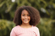 © Gelpi - Cute African American girl in the street with afro hair