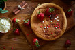 © Aleksey - Delicious cake with fresh organic strawberries and kitchen utensils, top view, close-up, selctive focus.
