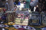 Fototapeta Paryż - BUKHARA, UZBEKISTAN - MAY 25, 2018: Silk and Spices Festival 2018. Colorful traditional uzbek ancient handmade exhibition in Bukhara, Uzbekistan.