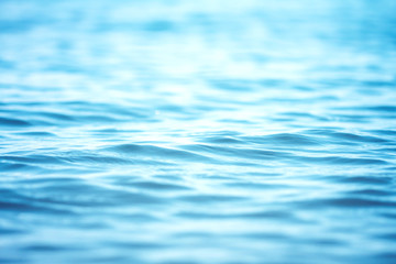 Wall Mural - blur beautiful shiny sparkling tropical blue sea beach , the fresh summer background .