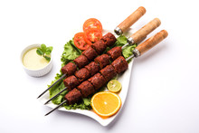 Indian Mutton Seekh Kabab Served With Green Salad, Selective Focus