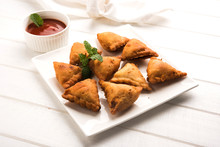 Homemade Mini Samosa Served With Red Sauce, Selective Focus