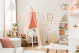Pink and gold baby's bedroom