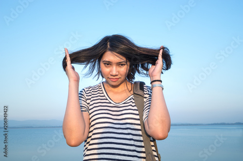 Get Asian Girls Portraits In Blue Sky Background Buy This Stock For iPhone Wallpaper Asian Girls Portraits In Blue Sky Background Buy This Stock For Android