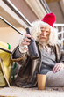 © Viacheslav Yakobchuk - Alcohol addicted. Selective focus of an empty bottle being in hands of a sad homeless man