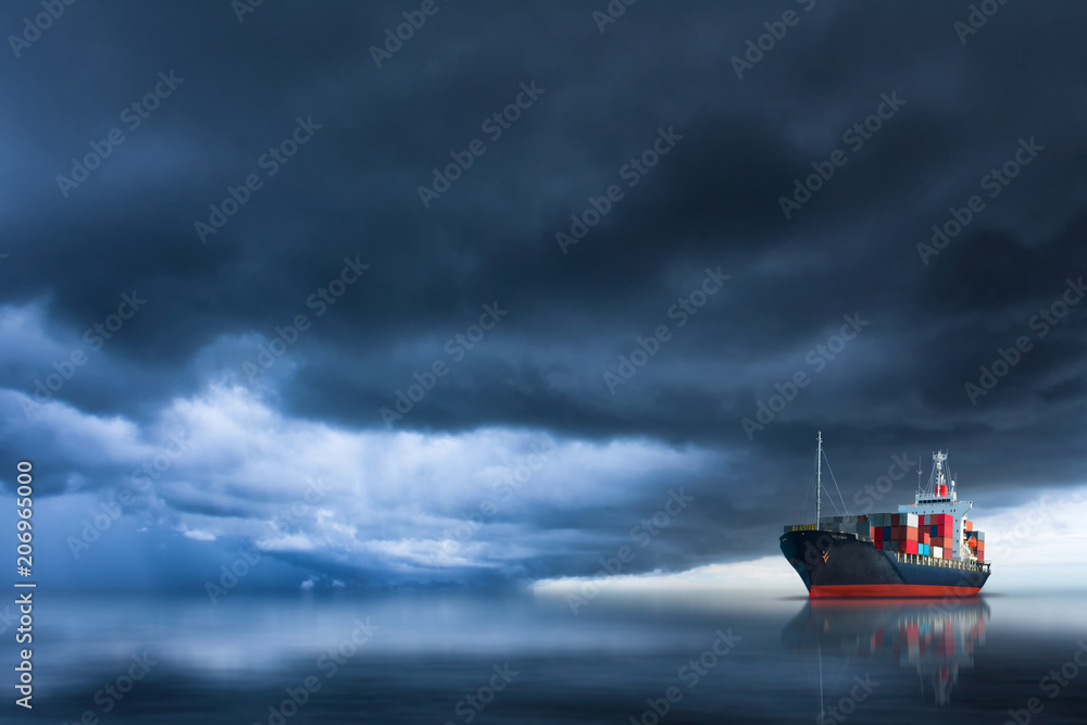cargo container ship sailing in the ocean with storm sky insurance ...