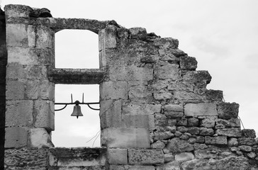 Ruins of antique chapel in Les-Baux-de-Provence village (Provence, France). Black and white photo.