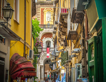 Narrow Alley With Duomo Steeple On The Background In Sorrento