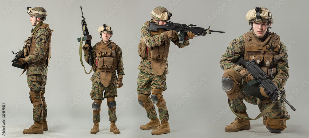 Soldier in camouflage holding rifle Stock Photo | Adobe Stock