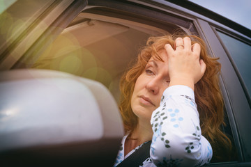 bored woman in the traffic jam