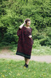 © BGStock72 - Young woman wearing sweater  and posing the park