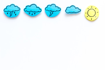 Wall Mural - modern weather icons set on white background top view copy space
