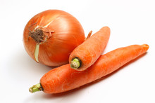 Onions And Carrots On A White Background