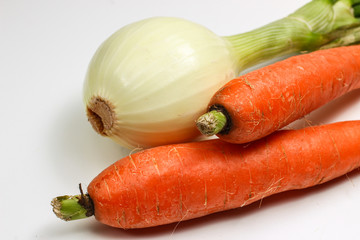 Sticker - Onions and carrots on a white background