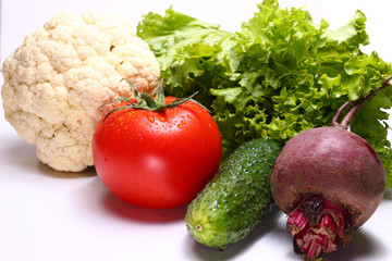 Poster - Tomato, beets, cauliflower and cucumber on a white background