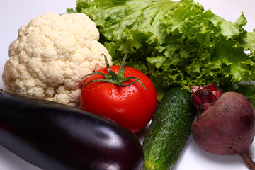 Poster - Tomato, beets, cauliflower and cucumber on a white background