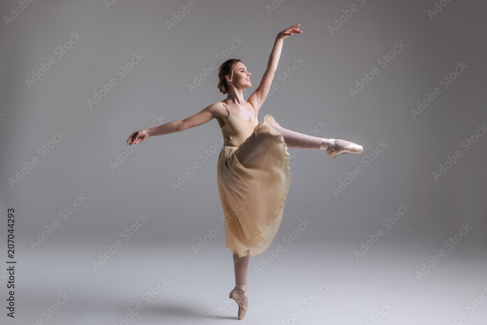 Dance to inspire! Full length side view of the classical ballet dancer ...