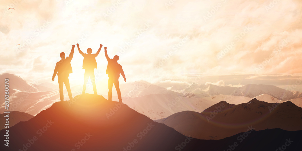 Silhouette of the team on the peak of mountain - obrazy, fototapety, plakaty 