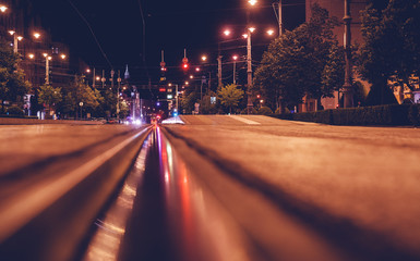 Wall Mural - Road in the night city, European city, tram tracks, Debrecen, Hungary