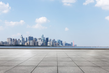 cityscape of modern city from empty asphalt road