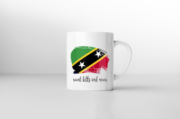 Saint Kitts and Nevis flag souvenir mug white background. 3D rendering.