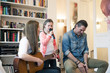 © Westend61 - Happy family making music together at home