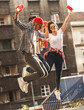 © BalanceFormCreative - Group of friends hangout at the street.They jumps and drinking cold juice.Fast food concept.