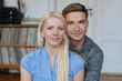 © contrastwerkstatt - Attractive young couple posing looking at camera