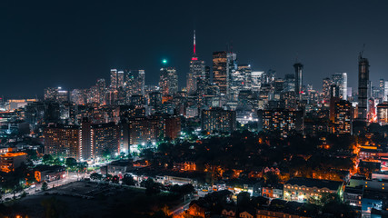 Cars Driving with the Toronto City Skyline