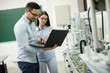 © BGStock72 - Young couple of students at robotics lab