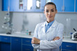 © Afshar Tetyana - Pretty self-confident scientist standing and looking straight.